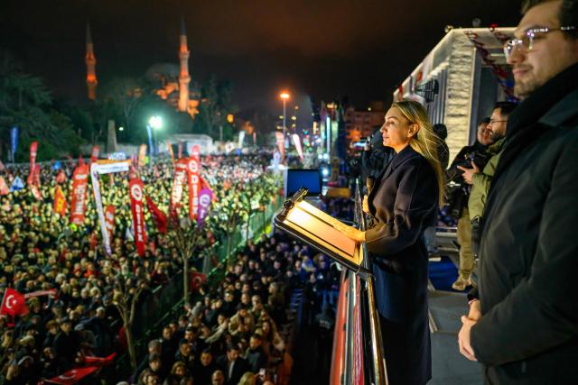 Dilek Imamoglu, the wife of jailed Istanbul mayor Ekrem Imamoglu of the main opposition Republican People's Party (CHP), speaks speaks during a protest marking one year since the detention of Istanbul Mayor Ekrem Imamoglu at Sarachane Square in Istanbul on March 18, 2026. Thousands of people gathered outside Istanbul City Hall March 18, 2026 to mark one year since the arrest of the city's mayor, Ekrem Imamoglu in a graft probe widely seen as a politically motivated act against the key opponent of President Recep Tayyip Erdogan. (Photo by Yasin AKGUL / AFP)