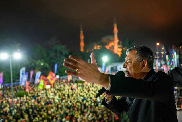 Turkey's main opposition Republican People's Party (CHP) Ozgur Ozel speaks during a protest marking one year since the detention of Istanbul Mayor Ekrem Imamoglu at Sarachane Square in Istanbul on March 18, 2026. Thousands of people gathered outside Istanbul City Hall March 18, 2026 to mark one year since the arrest of the city's mayor, Ekrem Imamoglu in a graft probe widely seen as a politically motivated act against the key opponent of President Recep Tayyip Erdogan. (Photo by Yasin AKGUL / AFP)