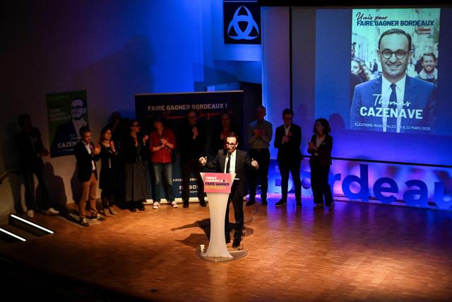 French liberal party Renaissance candidate running as Bordeaux mayor Thomas Cazenave delivers a speech during a campaign meeting ahead of the second round of the municipal elections in France, in Bordeaux on March 18, 2026. (Photo by Christophe ARCHAMBAULT / AFP)