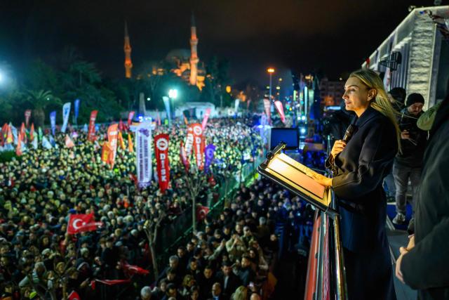 Dilek Imamoglu, the wife of jailed Istanbul mayor Ekrem Imamoglu of the main opposition Republican People's Party (CHP), speaks speaks during a protest marking one year since the detention of Istanbul Mayor Ekrem Imamoglu at Sarachane Square in Istanbul on March 18, 2026. Thousands of people gathered outside Istanbul City Hall March 18, 2026 to mark one year since the arrest of the city's mayor, Ekrem Imamoglu in a graft probe widely seen as a politically motivated act against the key opponent of President Recep Tayyip Erdogan. (Photo by Yasin AKGUL / AFP)