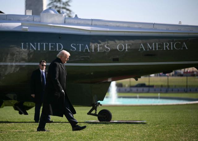 US President Donald Trump walks to the Oval Office at the White House in Washington, DC, as he returns from Dover Air Force Base in Delaware after attending a dignified transfer solemn event on March 18, 2026. President Trump traveled to Dover Air Force Base to pay his respects to 6 US military members who were killed during a crash of a refueling aircraft in western Iraq last week. (Photo by Oliver Contreras / AFP)
