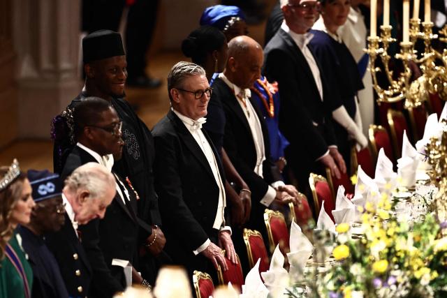 England rugby player Maro Itoje and Britain's Prime Minister Keir Starmer attend a State Banquet in St George's Hall, at Windsor Castle, in Windsor, on March 18, 2026, on the first day of a two-day State Visit to the United Kingdom by Nigeria's President. (Photo by Henry NICHOLLS / POOL / AFP)