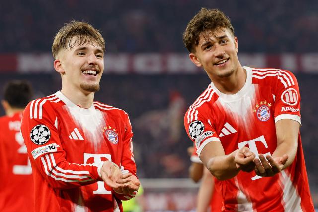 Bayern Munich's German midfielder #42 Lennart Karl celebrates scoring the 3-0 goal with his teammates including Bayern Munich's German midfielder #20 Tom Bischof (R) during the UEFA Champions League, Round of 16 2nd-leg football match between FC Bayern Munich and Atalanta in Munich, southern Germany, on March 18, 2026. (Photo by Alexandra BEIER / AFP)