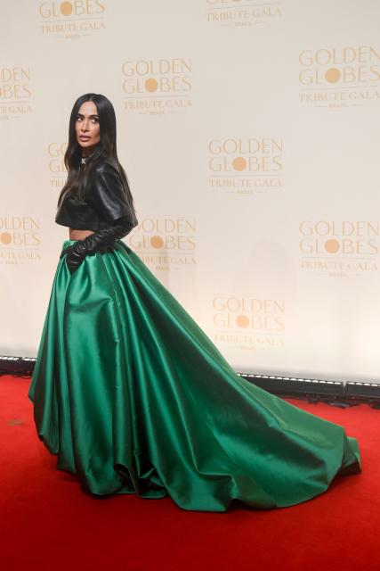 Brazilian fashionist and influencer Silvia Braz poses for a photo on the red carpet during the Golden Globes Tribute Gala at the Copacabana Palace Hotel in Rio de Janeiro, Brazil on March 18, 2026. (Photo by Daniel RAMALHO / AFP)