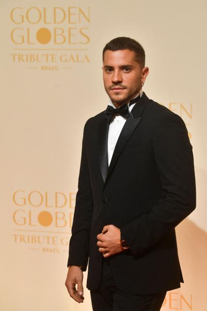 Brazilian actor Andre Lamoglia poses for a photo on the red carpet during the Golden Globes Tribute Gala at the Copacabana Palace Hotel in Rio de Janeiro, Brazil on March 18, 2026. (Photo by Daniel RAMALHO / AFP)
