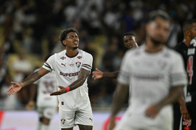 Fluminense's forward #09 John Kennedy reacts after missing a scoring opportunity during the Brasileirao Serie A football match between Vasco da Gama and Fluminense at the Maracana Stadium in Rio de Janeiro, Brazil, on March 18, 2026. (Photo by MAURO PIMENTEL / AFP)