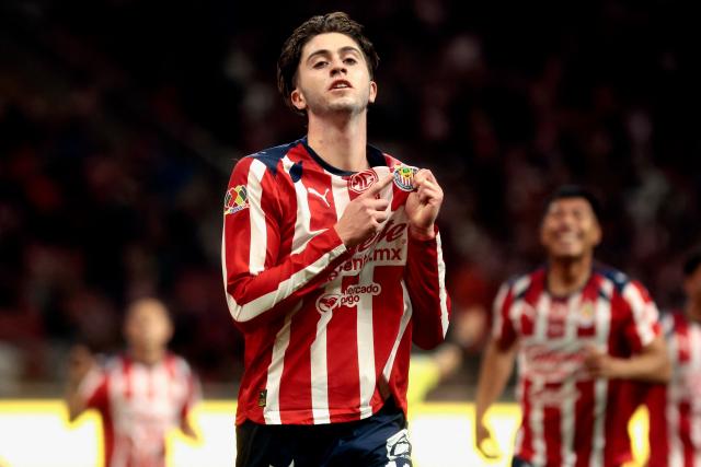 Guadalajara's midfielder #11 Brian Gutierrez celebrates scoring the opening goal during the Liga MX Clausura football match between Guadalajara and Leon at the Akron Stadium in Guadalajara, Mexico, on March 18, 2026. (Photo by Ulises Ruiz / AFP)