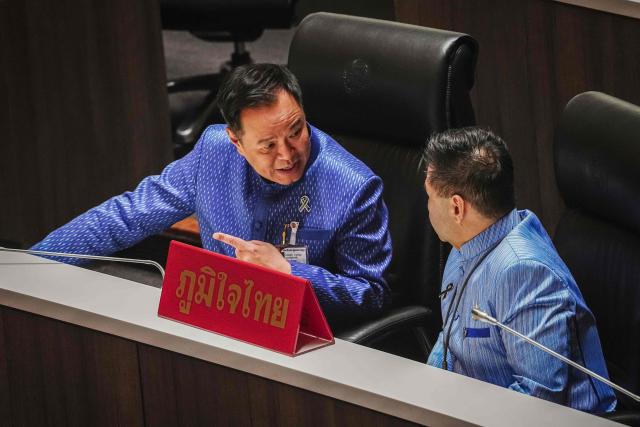 Bhumjaithai Party leader Anutin Charnvirakul gestures in Pparliament in Bangkok on March 19, 2026. Thailand's new parliament is set to elect Anutin as prime minister on March 19, keeping the conservative in the top office after his party routed its election rivals with a nationalist campaign. (Photo by chanakarn LAOSARAKHAM / AFP)