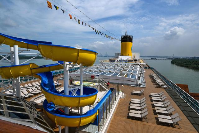 (FILES) This picture shows a view of the open deck of the Costa Serena cruise ship docked during its inauguration in Port Klang, on the outskirts of Kuala Lumpur on January 19, 2024. Athletes at the Asian Games in Japan will enjoy "a unique experience" staying on a cruise ship and in wooden containers, an organising official told AFP, but acknowledged there were concerns about the plan. (Photo by Mohd RASFAN / AFP)