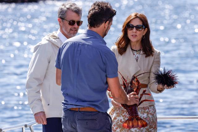 Denmark's King Frederik X (L) and Queen Mary (R) take a trip onboard an Institute for Marine and Antarctic Studies (IMAS) vessel to view the kelp conservation forest at the Alum Cliffs Marine Reserve in Hobart on March 19, 2026. (Photo by ROB BLAKERS / POOL / AFP)