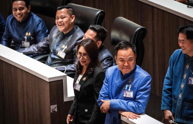 Thailand's caretaker Prime Minister and Bhumjaithai Party leader Anutin Charnvirakul (2nd R) looks on during a vote at Parliament in Bangkok on March 19, 2026. Thailand's new parliament elected Anutin Charnvirakul as prime minister, according to an AFP tally of the vote, keeping the conservative in the top office after his party routed its election rivals. (Photo by Chanakarn LAOSARAKHAM / AFP)