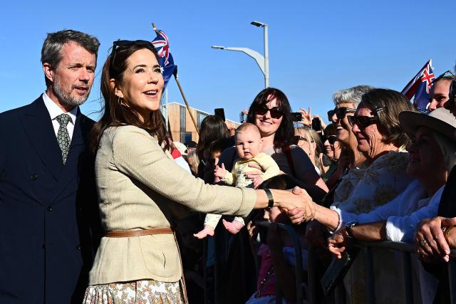 Denmark's King Frederik X and Queen Mary meet with members of the public during a visit to the waterfront in Hobart on March 19, 2026. (Photo by Steve BELL / POOL / AFP)