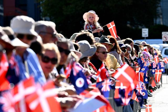 People wait to meet Denmark's King Frederik X and Queen Mary during their visit to the waterfront in Hobart on March 19, 2026. (Photo by Steve Bell / POOL / AFP)