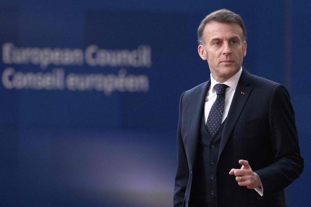 France's President Emmanuel Macron arrives for a EU Summit at the EU headquarters in Brussels, on March 19, 2026. European Union leaders meet in the context of the US-Israeli war against Iran that is consuming the Middle East, and its consequences on energy prices and security. (Photo by JOHN THYS / AFP)