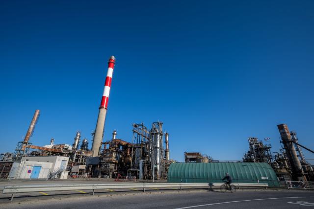 This photograph shows the Cressier's refinery operated by Varopreem, Switzerland’s only oil refinery still in operation, in Cressier on March 18, 2026. The US-Israeli war on Iran has expanded across the Gulf and beyond, upending global energy markets and trade, and virtually halting traffic in the Strait of Hormuz, through which a fifth of the world's crude oil travels. (Photo by Fabrice COFFRINI / AFP)