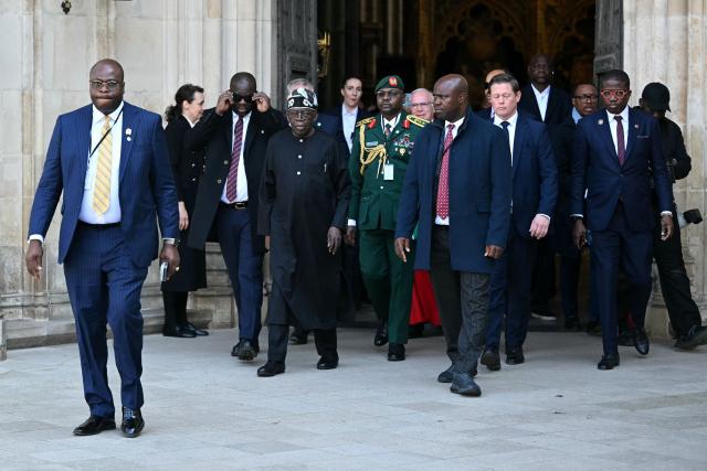 Nigeria's President Bola Tinubu (3L) departs Westminster Abbey following a visit, in central London on March 19, 2026, the second day of a two-day State Visit to the United Kingdom by Nigeria's President. (Photo by JUSTIN TALLIS / AFP)