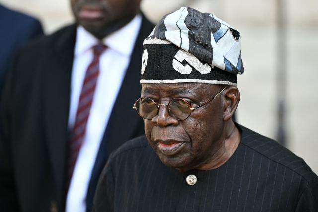 Nigeria's President Bola Tinubu departs Westminster Abbey following a visit, in central London on March 19, 2026, the second day of a two-day State Visit to the United Kingdom by Nigeria's President. (Photo by JUSTIN TALLIS / AFP)