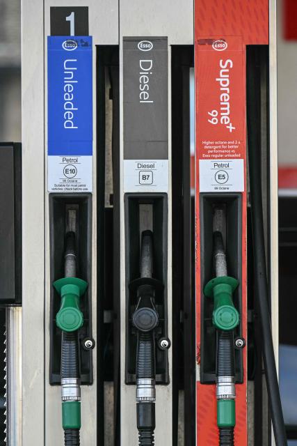 Petrol and diesel pumps are pictured at a petrol service station in Huddersfield, northern England on March 19, 2026. Britain's energy minister warned petrol retailers on March 13 that the government would not tolerate "unfair practices" amid a row over rising fuel prices sparked by the Middle East war. European gas prices soared as much as 35 percent on March 19 as fresh strikes hit energy infrastructure in the Middle East, including Qatar's main gas facility. (Photo by Oli SCARFF / AFP)