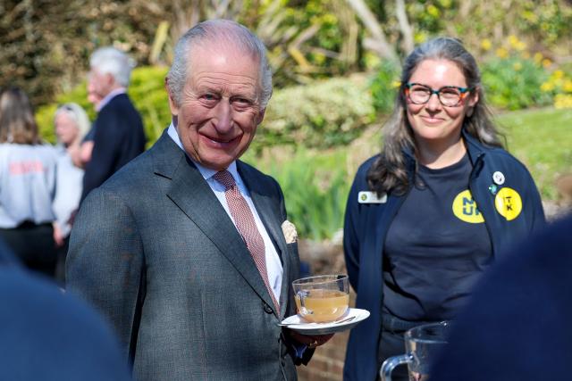Britain's King Charles III smiles as he attends a reception as he inaugurates the King Charles III England Coast Path at Seven Sisters National Nature Reserve, in Seaford south east England on March 19, 2026. (Photo by Chris Jackson / POOL / AFP)