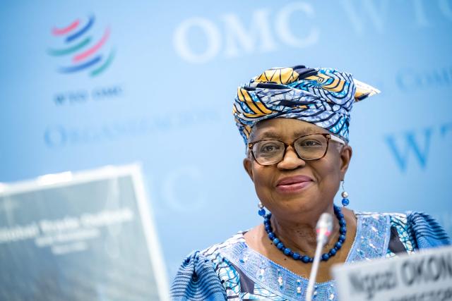 World Trade Organization (WTO) Director-General Ngozi Okonjo-Iweala gestures during the launch of the global trade outlook at the WTO headquarters in Geneva on March 19, 2026. (Photo by Fabrice COFFRINI / AFP)