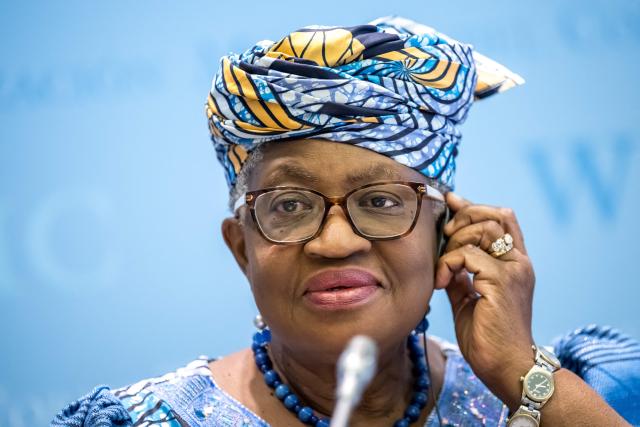 World Trade Organization (WTO) Director-General Ngozi Okonjo-Iweala listens during the launch of the global trade outlook at the WTO headquarters in Geneva on March 19, 2026. (Photo by Fabrice COFFRINI / AFP)