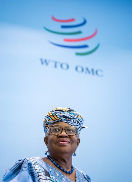 World Trade Organization (WTO) Director-General Ngozi Okonjo-Iweala looks on as she arrives to the launch of the global trade outlook at the WTO headquarters in Geneva on March 19, 2026. (Photo by Fabrice COFFRINI / AFP)