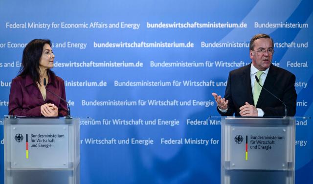 German Economy and Energy Minister Katherina Reiche (L) and German Defence Minister Boris Pistorius address a press conference on security and defence industry issues at the Ministry for Economic Affairs and Energy in Berlin on March 19, 2026. (Photo by John MACDOUGALL / AFP)