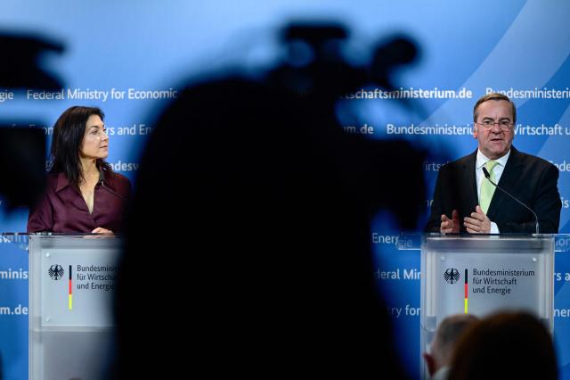 German Economy and Energy Minister Katherina Reiche (L) and German Defence Minister Boris Pistorius address a press conference on security and defence industry issues at the Ministry for Economic Affairs and Energy in Berlin on March 19, 2026. (Photo by John MACDOUGALL / AFP)