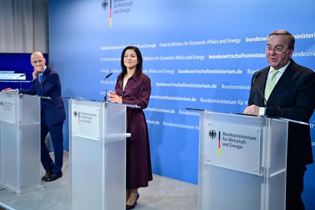 (R-L) German Defence Minister Boris Pistorius, German Economy and Energy Minister Katherina Reiche and Peter Leibinger, President of the Federation of German Industries (BDI) address a press conference on security and defence industry issues at the Ministry for Economic Affairs and Energy in Berlin on March 19, 2026. (Photo by John MACDOUGALL / AFP)