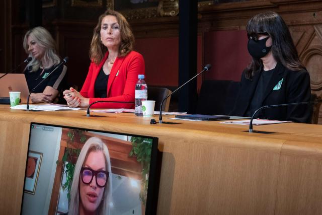 (FILES) (From L) British ex-BBC journalist Lisa Brinkworth (L), Dutch former model Thysia Huisman and Sonia, an anonymous victim, attend a video-conference on violence against women in the fashion industry, at the Senate, in Paris on September 14, 2021, after filing a criminal complaint in New York last month against Gerald Marie, the former Europe chief of the Elite modelling agency, accusing him of serial sexual assault. Fifteen women, including Lisa Brinkworth, alleging sexual violence in the modeling industry, called on the French justice system on March 19, 2026 to investigate Gérald Marie, a former head of a prestigious modeling agency, saying they have evidence of his links to American sex offender Jeffrey Epstein. (Photo by JOEL SAGET / AFP)