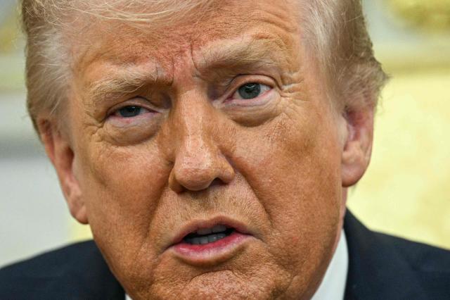 US President Donald Trump speaks during a meeting with Japan's Prime Minister Sanae Takaichi in the Oval Office of the White House in Washington on March 19, 2026. (Photo by Jim WATSON / AFP)