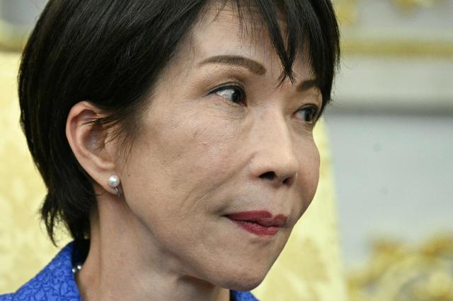 Japan's Prime Minister Sanae Takaichi looks on during a meeting with US President Donald Trump in the Oval Office of the White House in Washington on March 19, 2026. (Photo by Jim WATSON / AFP)