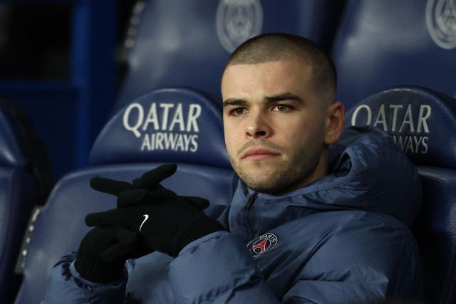 (FILES) Paris Saint-Germain's French goalkeeper #30 Lucas Chevalier sits on the bench prior to the  French L1 football match between Paris Saint-Germain (PSG) and AS Monaco at the Parc des Princes stadium in Paris on March 6, 2026. Goalkeeper Lucas Chevalier, now a substitute at PSG, has been called up for the French national team’s US tour, which will be led by captain Kylian Mbappй, who has only just returned from injury, national team manager Didier Deschamps announced on March 19, 2026. (Photo by FRANCK FIFE / AFP)