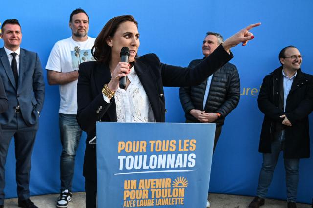 Far-right Rassemblement National (RN) Member of Parliament and Toulon mayoral candidate Laure Lavalette gestures as she gives a speech during a campaign meeting in Toulon, southeastern France, on March 19, 2026, ahead of the second round of the municipal elections. French voters are scheduled to head to the polls on March 22, 2026. (Photo by Miguel MEDINA / AFP)