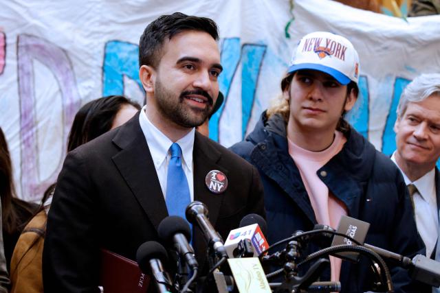 Mayor of New York Zohran Mamdani next to Dylan Contreras, a high school student who was recently released from federal custody, speaks during a press conference at Middle Collegiate Church in New York City on March 19, 2026. Democrats and activists on March 19 celebrated the release of a US high school student from Venezuela who spent 10 months in custody after his arrest by immigration officials enforcing President Donald Trump's mass deportation plans. Dylan Contreras, 21, was detained last May after attending an immigration hearing at a New York City court and then transferred to a detention facility in Pennsylvania, sparking a widespread backlash. (Photo by Leonardo Munoz / AFP)