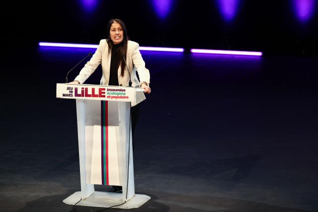 French leftist party La France Insoumise (LFI) candidate for mayor of Lille Lahouaria Addouche speaks during a campaign meeting in Lille, northern France, on March 19, 2026, ahead of the second round of France's 2026 municipal elections. French voters are scheduled to head to the polls for the second round of municipal elections on March 22, 2026. (Photo by Sameer AL-DOUMY / AFP)