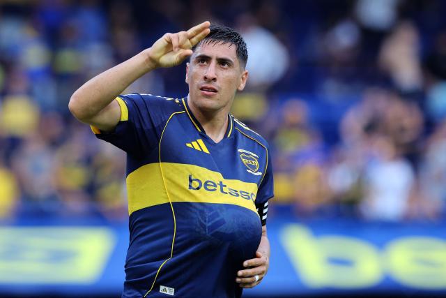 (FILES) Boca Juniors' Uruguayan forward #16 Miguel Merentiel celebrates after scoring the equalising goal during the Argentine Professional Football League 2026 Apertura Tournament match between Boca Juniors and Gimnasia y Esgrima de Mendoza at La Bombonera Stadium in Buenos Aires on February 28, 2026. With four goals in as many matches, Uruguayan striker Miguel Merentiel kept Boca Juniors afloat amid a run of poor results that has put manager Claudio Ubeda under pressure. The striker is seen as Ubeda and Boca's trump card for the Argentine Apertura match against Instituto at La Bombonera, on March 22, 2026. (Photo by ALEJANDRO PAGNI / AFP)