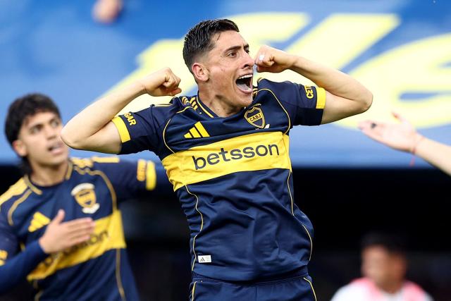 (FILES) Boca Juniors' Uruguayan forward #16 Miguel Merentiel celebrates scoring his team's second goal during the Argentine Professional Football League 2025 Clausura Tournament match between Boca Juniors and River Plate at the La Bombonera Stadium in Buenos Aires on November 9, 2025. With four goals in as many matches, Uruguayan striker Miguel Merentiel kept Boca Juniors afloat amid a run of poor results that has put manager Claudio Ubeda under pressure. The striker is seen as Ubeda and Boca's trump card for the Argentine Apertura match against Instituto at La Bombonera, on March 22, 2026. (Photo by ALEJANDRO PAGNI / AFP)