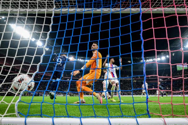 Players react duing a goal in the the UEFA Europa League last 16 second leg football match between Olympique Lyonnais (OL) and RC Celta de Vigo at the Groupama Stadium in Lyon, central-eastern France, on March 19, 2026. (Photo by OLIVIER CHASSIGNOLE / AFP)