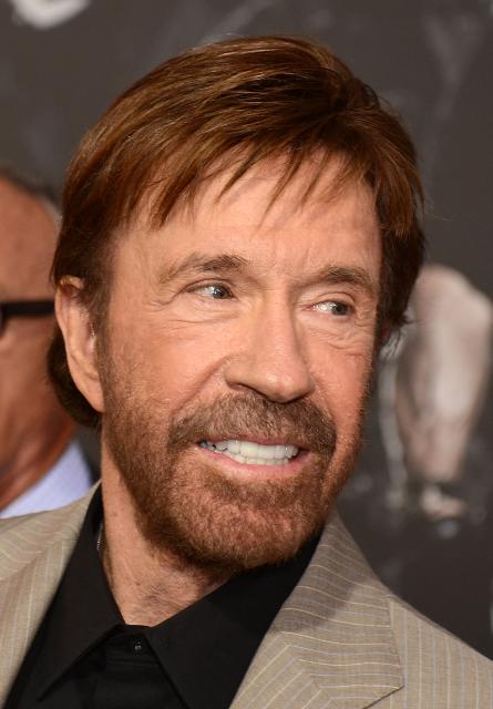 (FILES) Cast member Chuck Norris arrives at the premiere of "The Expendables 2," at Grauman's Chinese Theatre in Hollywood California August 15, 2012. American action star Chuck Norris has been hospitalized in Hawaii for an undisclosed condition, Hollywood news site TMZ reported March 19, citing a source who said the actor was "in good spirits." A representative for Norris did not immediately comment on the report, which said the "emergency" occurred within the last 24 hours on the island of Kauai. Norris turned 86 last week, marking the event with a video of him boxing on social media and saying "I don't age. I level up." (Photo by Robyn BECK / AFP)