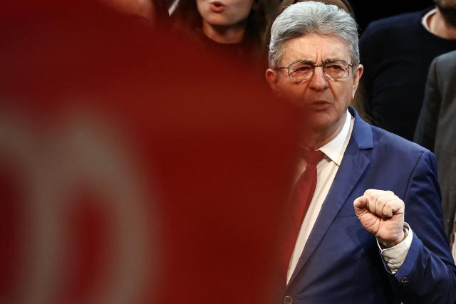 Founder of French left-wing party La France Insoumise (LFI) Jean-Luc Melenchon sings at the end of a campaign meeting in Lille, northern France, on March 19, 2026, ahead of the second round of France's 2026 municipal elections. French voters are scheduled to head to the polls for the second round of municipal elections on March 22, 2026. (Photo by Sameer AL-DOUMY / AFP)