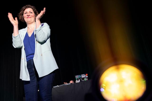 Incumbent mayor of Strasbourg and Les Ecologistes candidate for re-election Jeanne Barseghian applauds during a campaign rally in Strasbourg on March 19, 2026, ahead of the second round of France's municipal elections. Barseghian, who has fallen behind the former Socialist mayor, reached an agreement with Left-wing La France Insoumise (LFI) for the second round. (Photo by ROMEO BOETZLE / AFP)