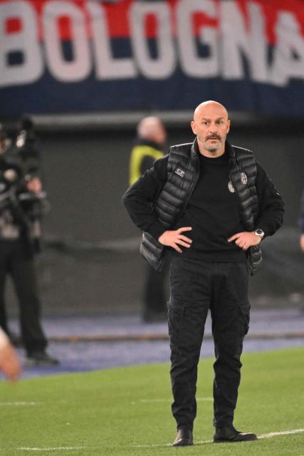 Bologna's Italian head coach Vincenzo Italiano looks on during the UEFA Europa League last 16 2nd leg football match between AS Roma and Bologna at the Olympic Stadium in Rome on March 19, 2026. (Photo by Alberto PIZZOLI / AFP)
