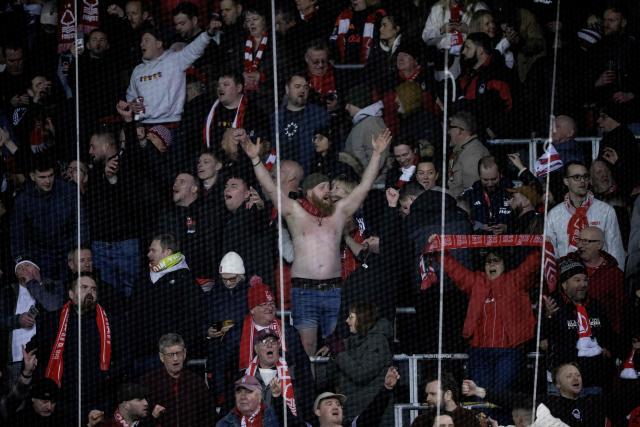 Nottingham Forest's fans celebrate the victory after the UEFA Europa League football match, last 16 second leg, between FC Midtjylland and Nottingham Forest in Herning, Denmark on March 19, 2026. (Photo by Bo Amstrup / Ritzau Scanpix / AFP) / Denmark OUT