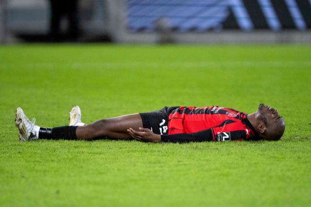 Midtjylland's Zambian forward #14 Edward Chilufya reacts after missing his shoot in the penalty kicks during the UEFA Europa League football match, last 16 second leg, between FC Midtjylland and Nottingham Forest in Herning, Denmark on March 19, 2026. (Photo by Bo Amstrup / Ritzau Scanpix / AFP) / Denmark OUT