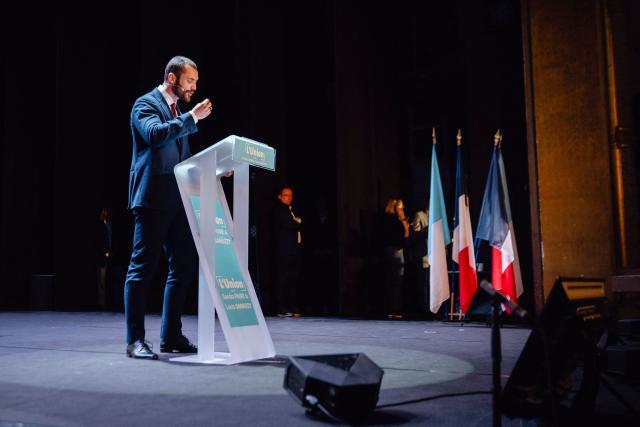 TOPSHOT - Menton's first deputy candidate for the new right-wing list 'The Union!' (L'Union!) Louis Sarkozy addresses supporters during a campaign meeting with Menton's mayoral candidate in Menton, southern France on March 19, 2026, ahead of the second round of France's 2026 municipal elections. (Photo by Frederic DIDES / AFP)