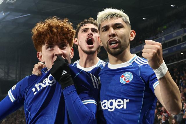 Strasbourg’s Argentine defender #32 Valentin Barco (L) celebrates with teammates after scoring his team's first goal during the UEFA Europa Conference League last 16 second leg football match between RC Strasbourg Alsace and Rijeka at the Stade de la Meinau in Strasbourg, eastern France, on March 19, 2026. (Photo by Frederick FLORIN / AFP)
