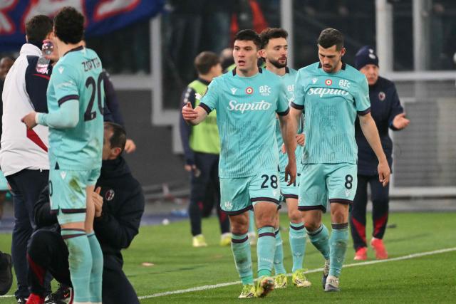 Bologna's Italian forward #28 Nicolo Cambiaghi celebrates scoring his team's fourth goal in the extra times during the UEFA Europa League last 16 2nd leg football match between AS Roma and Bologna at the Olympic Stadium in Rome on March 19, 2026. (Photo by Alberto PIZZOLI / AFP)