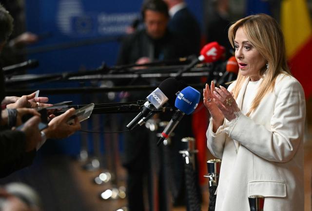 Italy's Prime Minister Giorgia Meloni arrives for a press conference during the EU Summit at the EU headquarters in Brussels, on March 19, 2026. European Union leaders meet in the context of the US-Israeli war against Iran that is consuming the Middle East, and its consequences on energy prices and security. (Photo by NICOLAS TUCAT / AFP)
