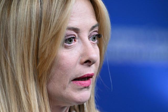 Italy's Prime Minister Giorgia Meloni arrives for a press conference during the EU Summit at the EU headquarters in Brussels, on March 19, 2026. European Union leaders meet in the context of the US-Israeli war against Iran that is consuming the Middle East, and its consequences on energy prices and security. (Photo by NICOLAS TUCAT / AFP)
